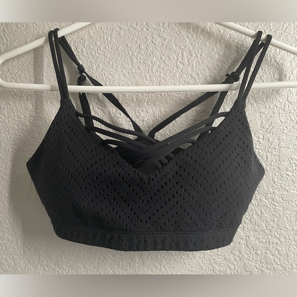 Lorna Jane Black Textured Sports Bra. Strappy in the front. Size Small.